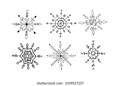 Set of doodle Christmas snowflake isolated on white. Vector illustration.