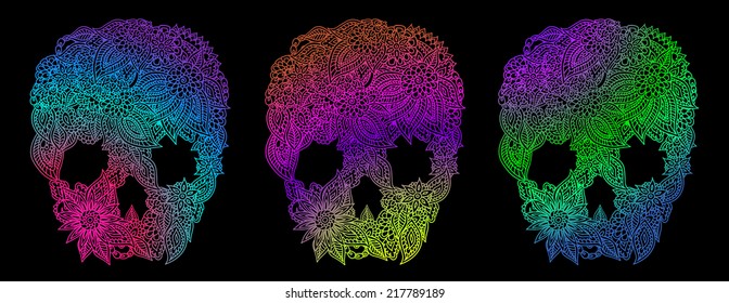 Set of doodle floral skulls over black.