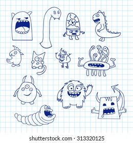Set of doodle monsters icons on notebook