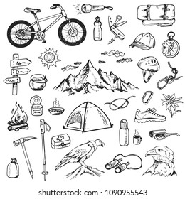 Set of doodle mountain camping design elements. Hand drawn vector illustrations isolated on a white background.