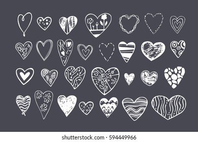 Set of doodle red hearts
