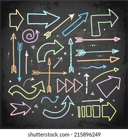 Set of doodle sketch arrows hand-drawn with color chalks on blackboard. Vector illustration. 