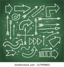 Set of doodle sketch arrows on blackboard. Vector illustration.  