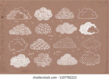 Set of doodle sketch clouds on brown parcel paper background. 