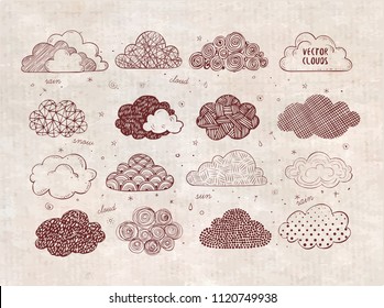 Set of doodle sketch clouds on vintage background.