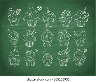 Set of doodle sketch cupcakes with decorations on blackboard background. Vector illustration.