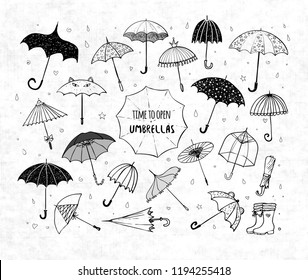 Set of doodle sketch umbrellas on rice paper background