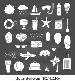 Set of doodle summer and vacation items isolated on the blackboard.