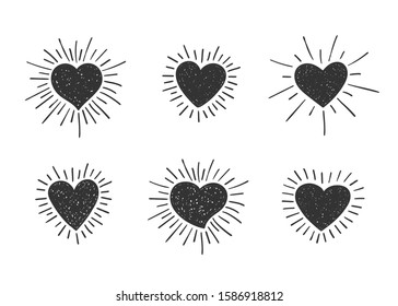 Set of doodle textured heart shapes with retro styled sun rays. Collection of different hand drawn romantic hearts for sticker, label, love logo and Valentines day design.