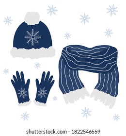 Set of doodle winter clothes. Dark blue hat, glove and scarf with light fur and snowflakes on white isolated background.