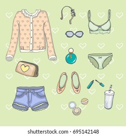 Set of drawing female clothes in vector on green background