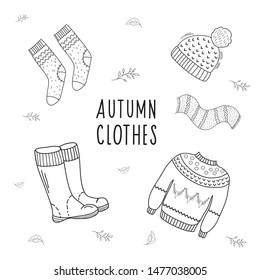 Set of drawings of autumn clothes. Illustration by hand in the style of doodle. Linear illustartion