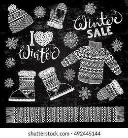 Set drawings knitted woolen clothing and footwear. Sweater, hat, mitten, boot, scarf with patterns, snowflakes. Stylized drawing chalk on blackboard. Isolated vector illustration.