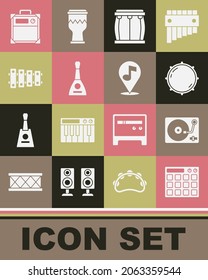 Set Drum machine, Vinyl player with vinyl disk, Dial knob level, Balalaika, Xylophone, Guitar amplifier and Location musical note icon. Vector