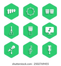 Set Drum, Treble clef, Microphone, Music note, tone, Guitar,  and Pan flute icon. Vector