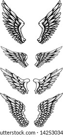 Set of eagle wings in tattoo style. Design elements for logo, label, sign, poster, t shirt. Vector illustration