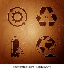 Coloque el globo y la planta de la Tierra, el panel de energía solar, la botella de plástico de reciclaje y el símbolo de reciclaje y la hoja sobre fondo de madera. Vector