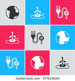 Set Earth globe, Wind turbine and Electric saving plug leaf icon. Vector