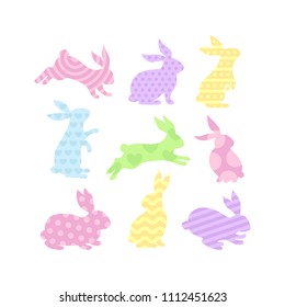 A set of Easter bunnies silhouette in different shapes and actions isolated on a white background.Cartoon vector element.