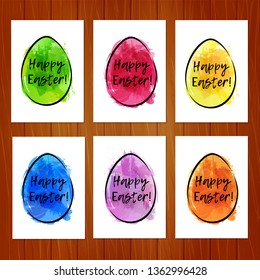 Set of Easter cards with colorful eggs on wooden background. Imitation of watercolor. Template for greeting Easter cards.