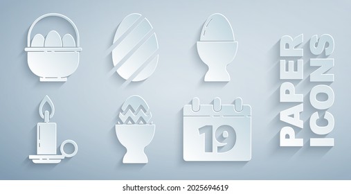 Set Easter egg on a stand, Burning candle in candlestick, Calendar with Happy,  and Basket easter eggs icon. Vector