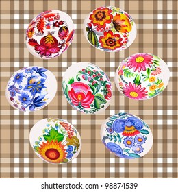 set of Easter eggs against plaid