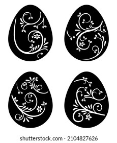 Set of Easter eggs with floral ornament. Contour, template, stencil for cutting on a plotter, creating postcards, printing, home decoration. Black silhouette of an egg with a cut-out pattern. Vector