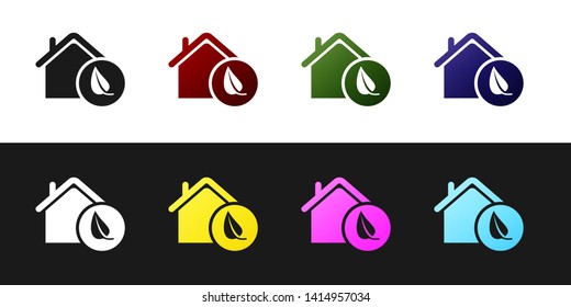 Set Eco friendly house icon isolated on black and white background. Eco house with leaf. Vector Illustration