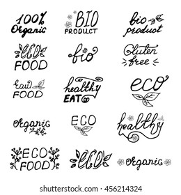 Set of eco organic bio logos, labels. Hand drawn signs. Raw, vegetarian food badges, stamps and stickers. Organic tags and elements for cafe,restaurants, products packaging etc. Vector 