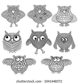Set of eight amusing ornate black and white owls with circles isolated on the white background, vector illustration