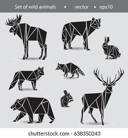 A set of eight animals. Wild animals in the flat Graphics. Black and white image of elk, bear, deer, wolf, fox, raccoon, squirrel and hare for design and logos.