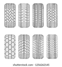 Set of eight black car tire tracks with dots