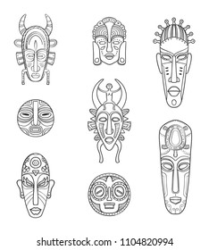 Set of eight different African masks on a white background.