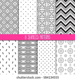 set of eight different ornamental white and black patterns. Ethnic floral and geometric ornaments