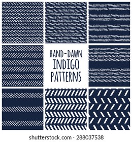 Set of eight indigo blue and white seamless hand drawn texture designs for backgrounds, vector illustration