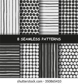 Set of eight seamless hand drawn graphic patterns with dotted and stripes in black and white colors. Polka dotted pattern. Striped background. Made in vector