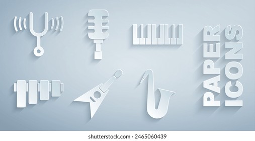 Set Electric bass guitar, Music synthesizer, Pan flute, Musical instrument saxophone, Microphone and tuning fork icon. Vector