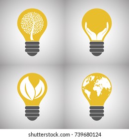 Set of electric bulbs with eco symbols inside