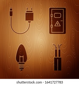 Set Electric cable, Charger, Light bulb and Electrical cabinet on wooden background. Vector