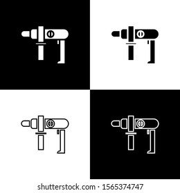 Set Electric drill machine icon isolated on black and white background. Repair tool.  Vector Illustration