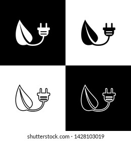 Set Electric saving plug in leaf icons isolated on black and white background. Save energy electricity icon. Environmental protection icon. Bio energy. Vector Illustration