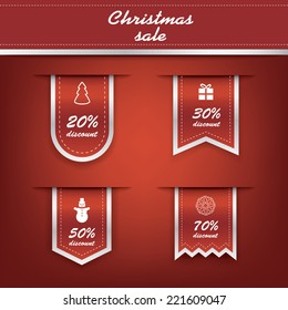 Set of elegant Christmas vertical ribbon tags with winter discounts and sales symbols. Eps10 vector illustration.