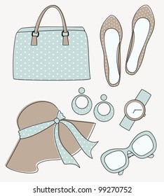 A set of elegant female fashion accessories in pastel colors.