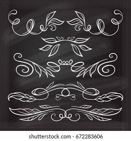 Set of elegant floral elements on the chalkboard.