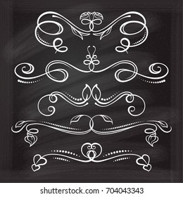 Set of elegant floral elements on the chalkboard.