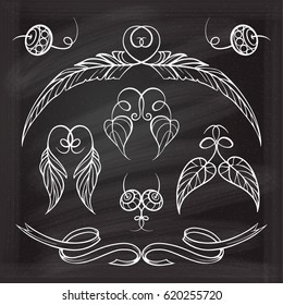 Set of elegant floral elements for your design on the chalkboard.