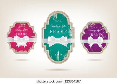 A set of elegant paper retro labels with peeled off paint and silky ribbon bow knots