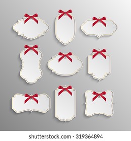 Set of elegant realistic white paper tags with red bows and golden elements. Vector EPS10 illustration. 