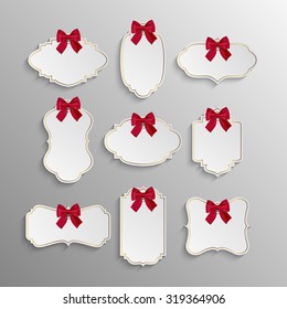 Set of elegant realistic white paper tags with red bows and golden elements. Vector EPS10 illustration. 