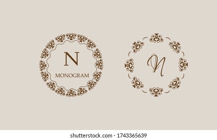 Set of elegant round floral monograms with the letter N brown. Design templates for invitations, menus, labels. Business logo is identical for a restaurant, hotel, heraldry, jewelry.